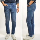 mstang slim fit stretchable medium blue tapered leg knit denim jeans for men