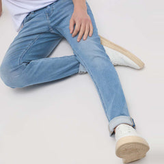 mstang slim fit stretchable light blue blue tapered leg knit denim jeans for men